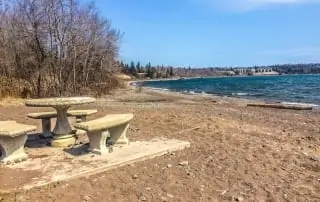 Burlington bay beach and stone chairs and table.