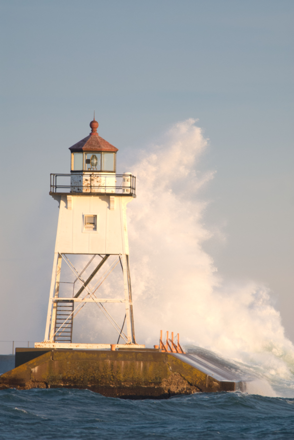 Waves Crashing Into Lighthouse | Grand Marais, MN Vacation Homes